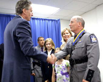 Lt Gov Duffy shakes hands with Trooper Gerald Segur
